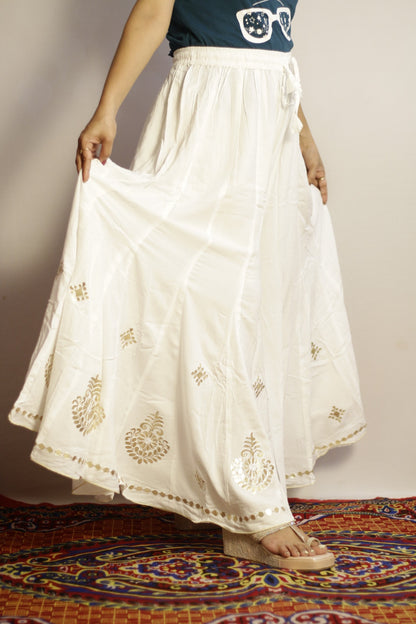 White gotta patti palazzo side view showing the drawstring waist and gold motifs