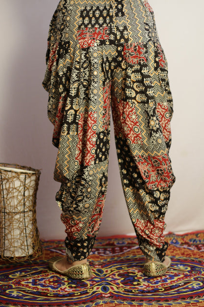 Back view of the black patchwork print dhoti with gathered waistband